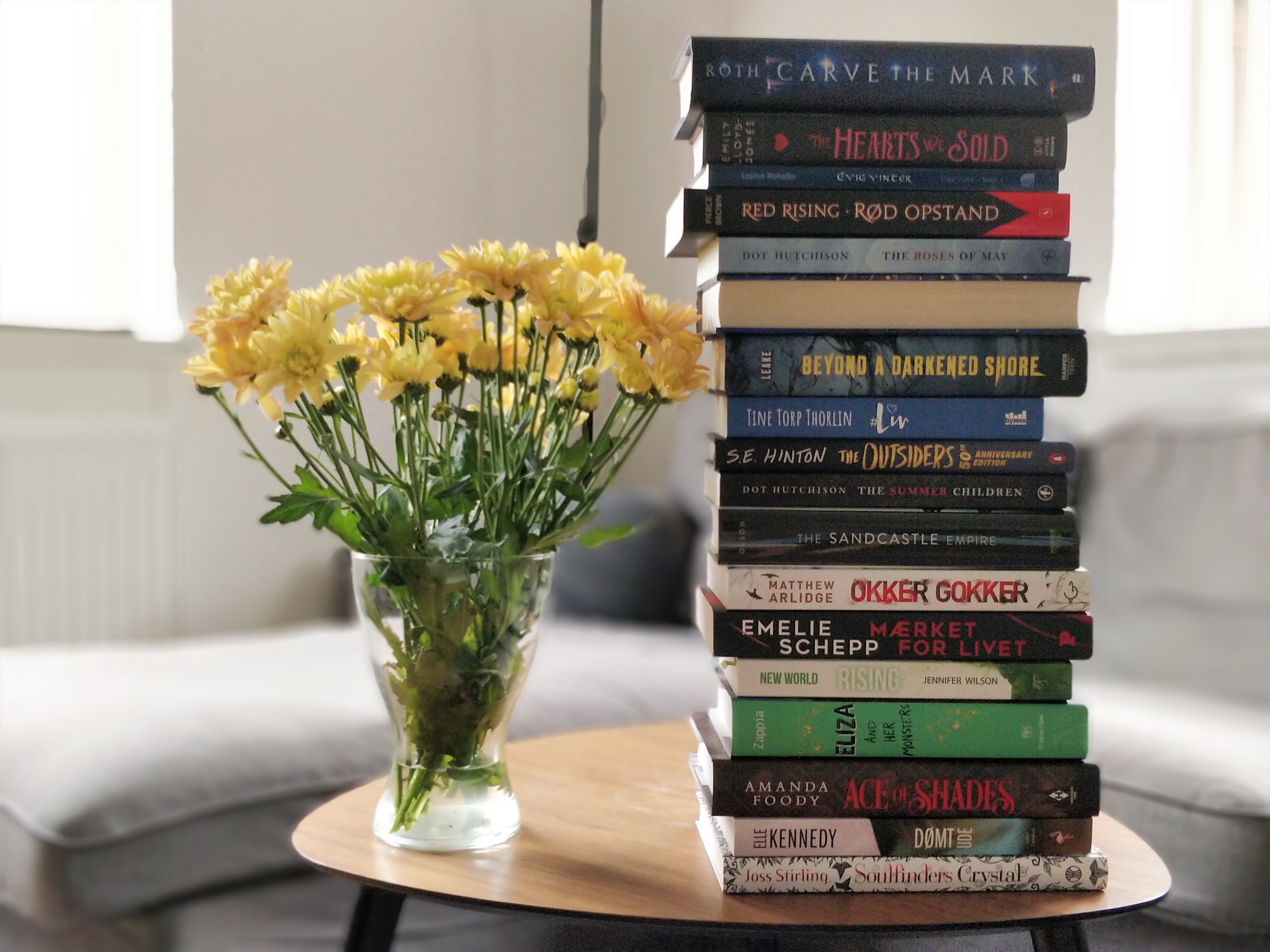 A stack of books that spell Cherryblossomreads